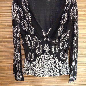 Shear black and white patterned blouse